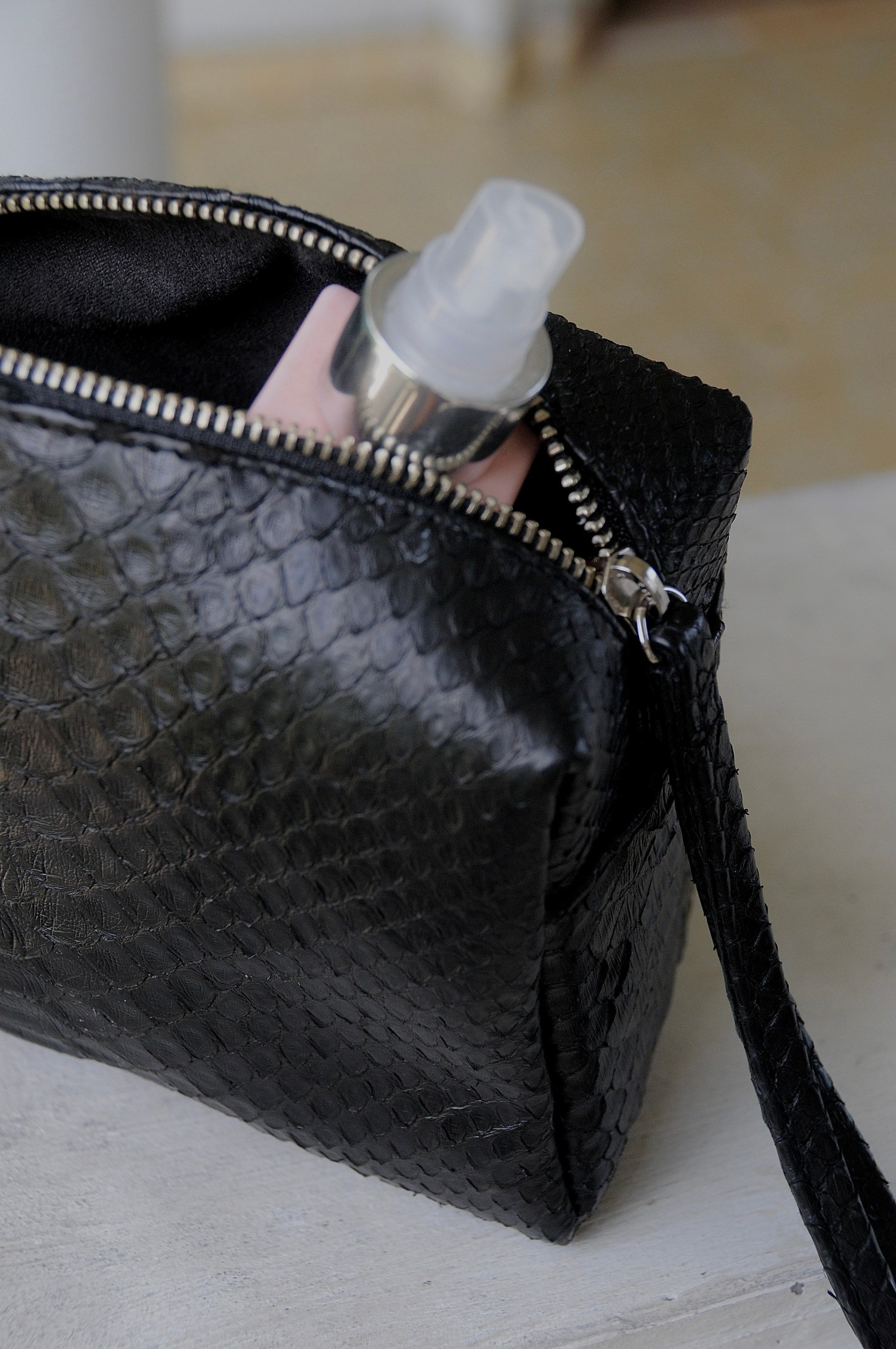Genuine python skin black cosmetic bag