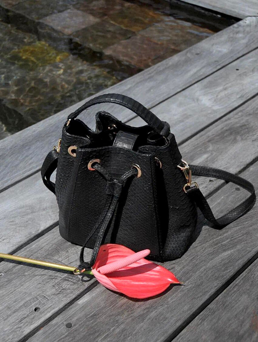 Genuine python skin black bucket crosshandle bag