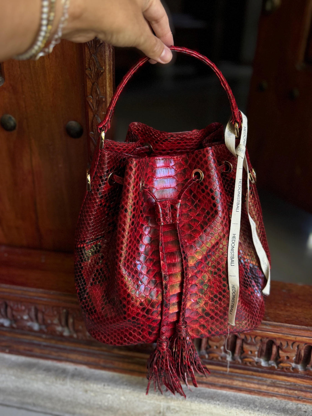 Genuine python skin red bucket crosshandle bag
