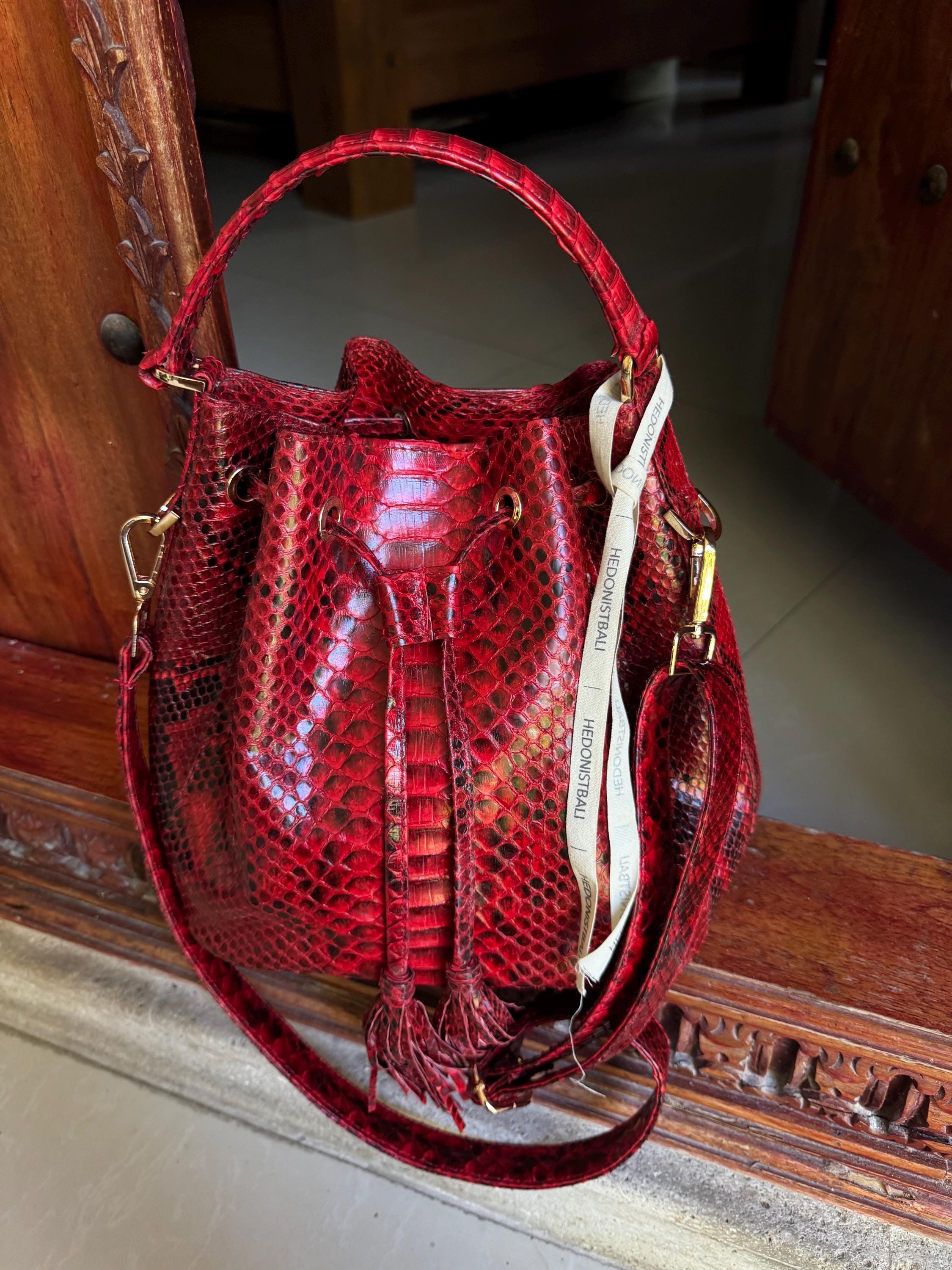 Genuine python skin red bucket crosshandle bag