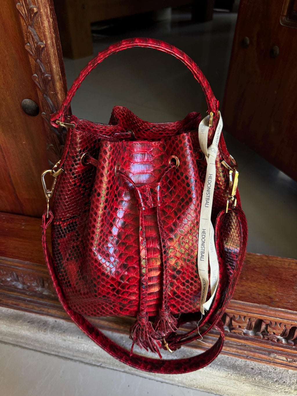 Genuine python skin red bucket crosshandle bag