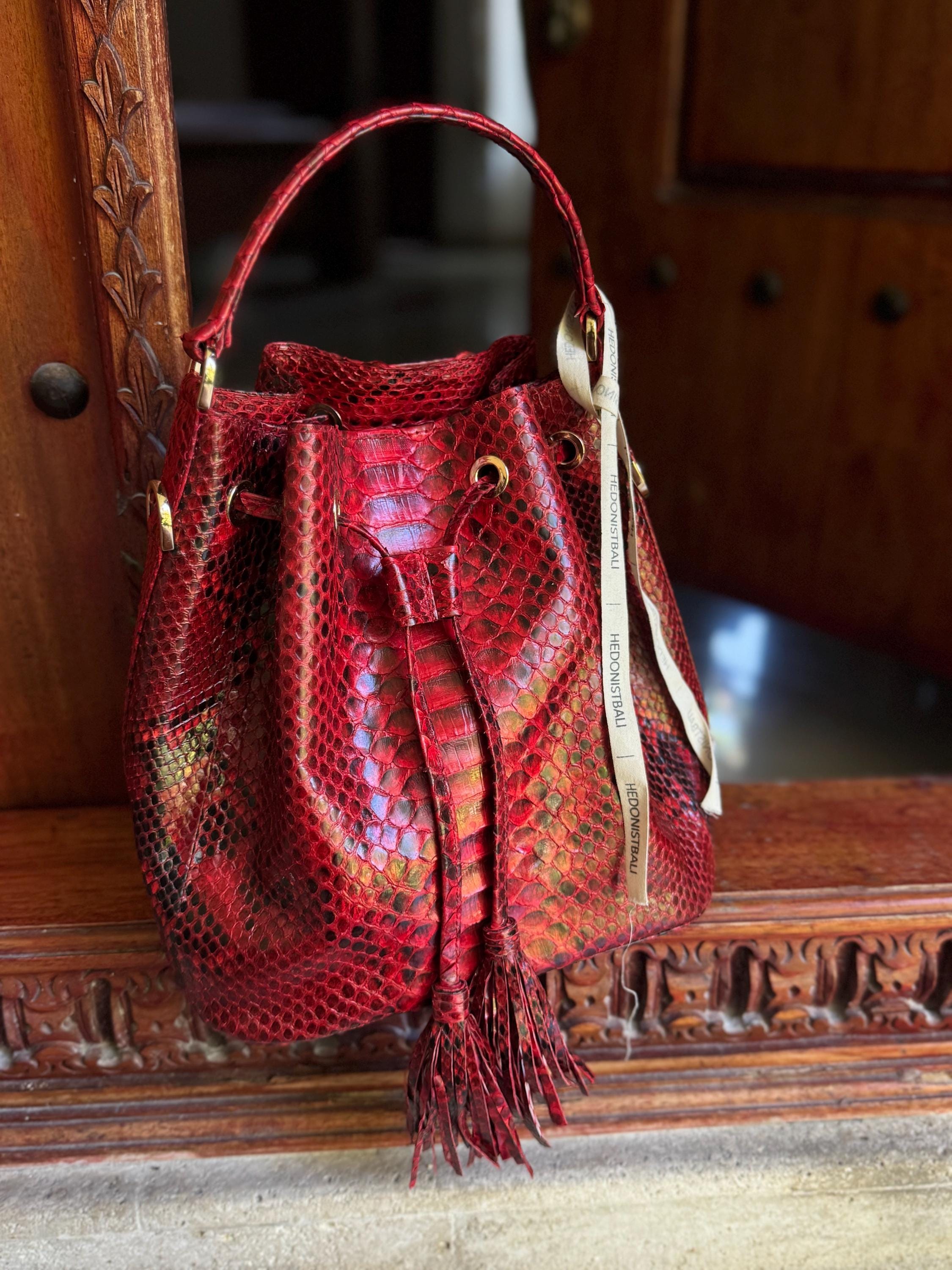 Genuine python skin red bucket crosshandle bag