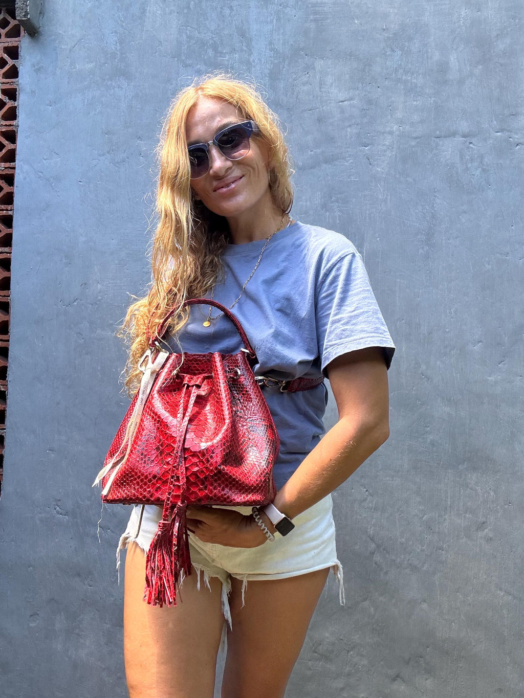 Genuine python skin red bucket crosshandle bag