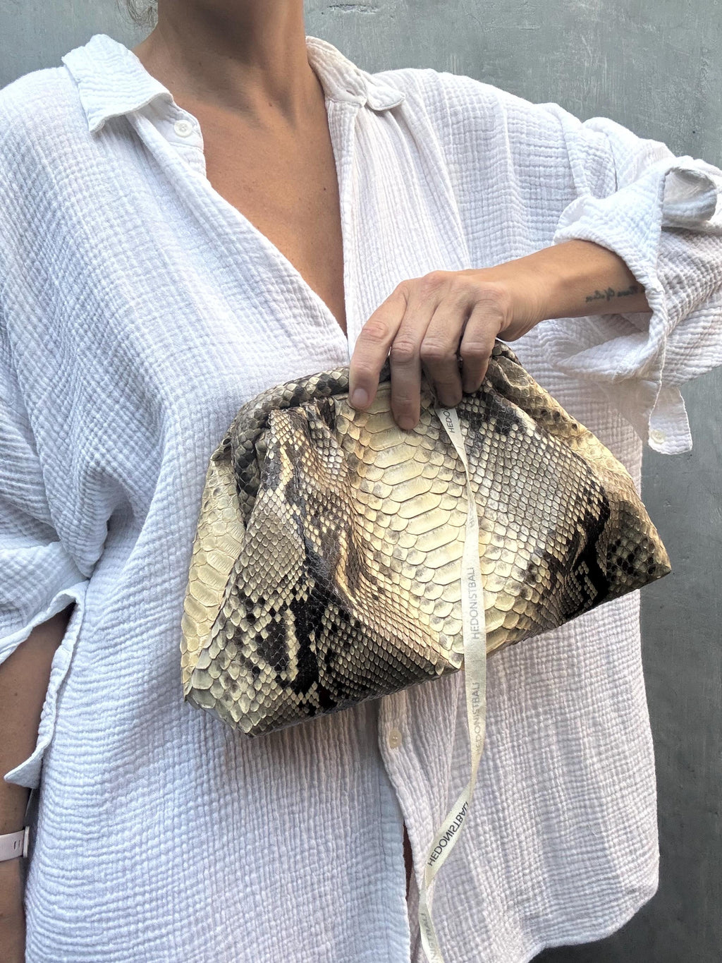 Genuine python skin beige  pouch bag