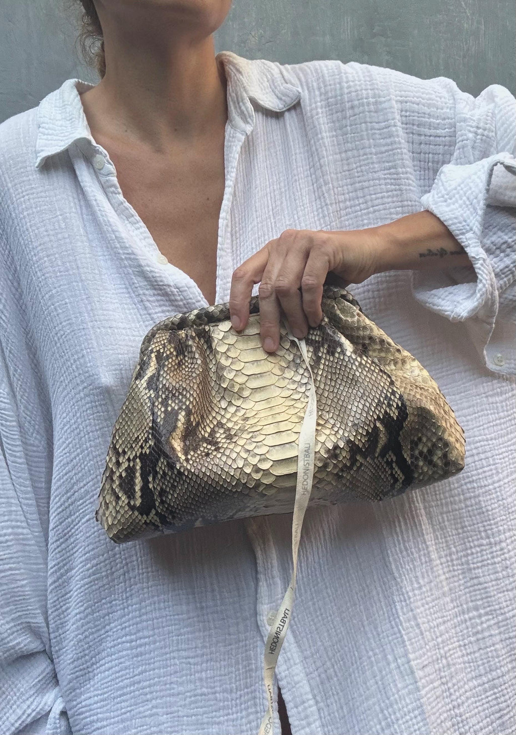 Genuine python skin beige  pouch bag